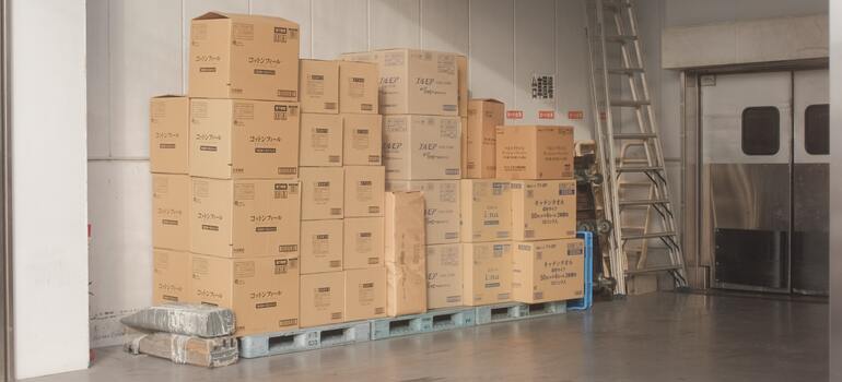 thinking how hiring movers can help you be more environmentally-friendly in CA when using boxes