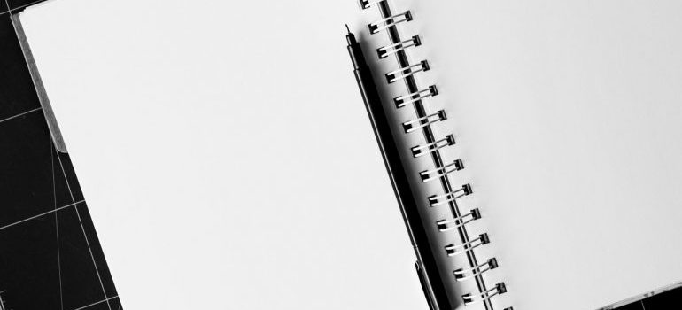 A notepad and pen.