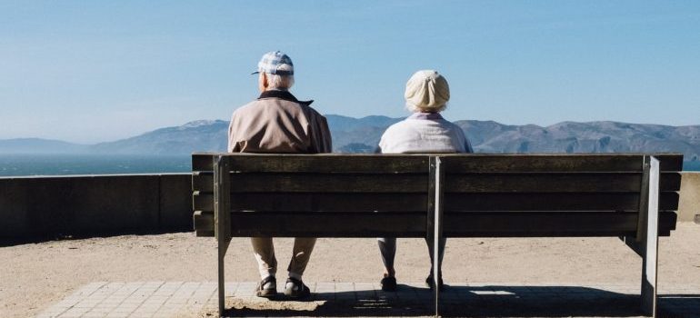 Seniors sitting on a bench