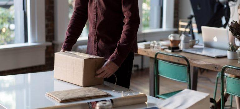 A man packing for his move