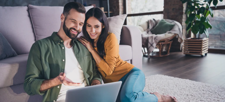 a couple on a laptop